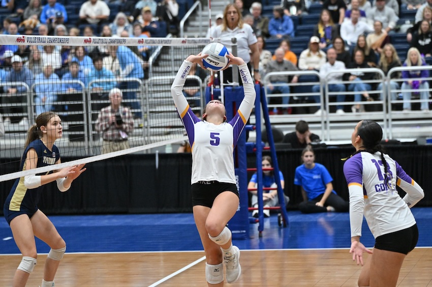 Reagan Zuiderveen sets for a Kalamazoo Christian teammate. She finished with 40 assists and 15 digs as the 2023 champion Comets closed this season 31-9-2.