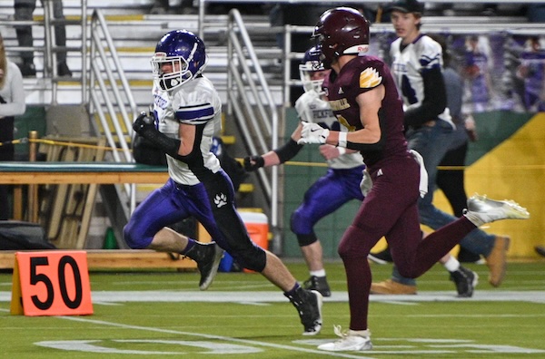 Pickford quarterback Tommy Storey (8) breaks away for his second touchdown run of the first half.