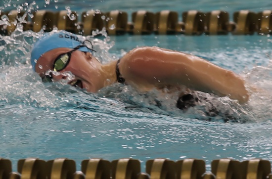 Skyline’s Adrienne Schadler swims to one of her two individual titles.