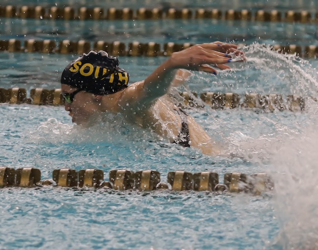 Grosse Pointe South’s Caroline Bryan powers to the championship in the butterfly. 