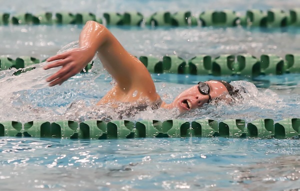 East Grand Rapids’ Ellery Chandler swims the breaststroke during Friday’s preliminaries at Oakland University.