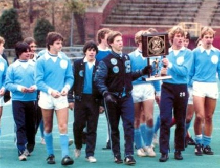 Livonia Stevenson players carry their championship trophy after winning the 1982 Class A soccer title at Atwood Stadium.