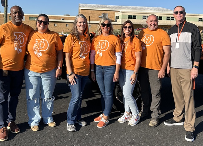 Blomgren, far right, is pictured with members of the Dowagiac Board of Education before the start of the 2024 Homecoming Parade. 