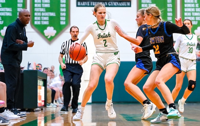 Smucker (2) takes on a pair of defenders during the Irish’s Feb. 7 win over Lawton. 