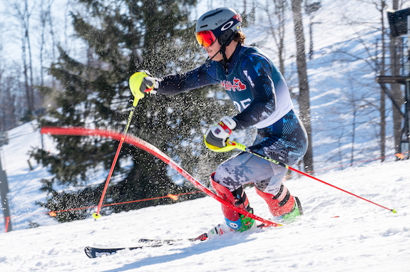 Gaylord’s Keaton Abraham clears a gate on the way to finishing first in slalom.