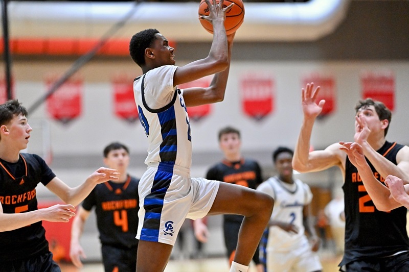 Carman-Ainsworth’s Anthony Mull (20) drives during last week’s win over Rockford.