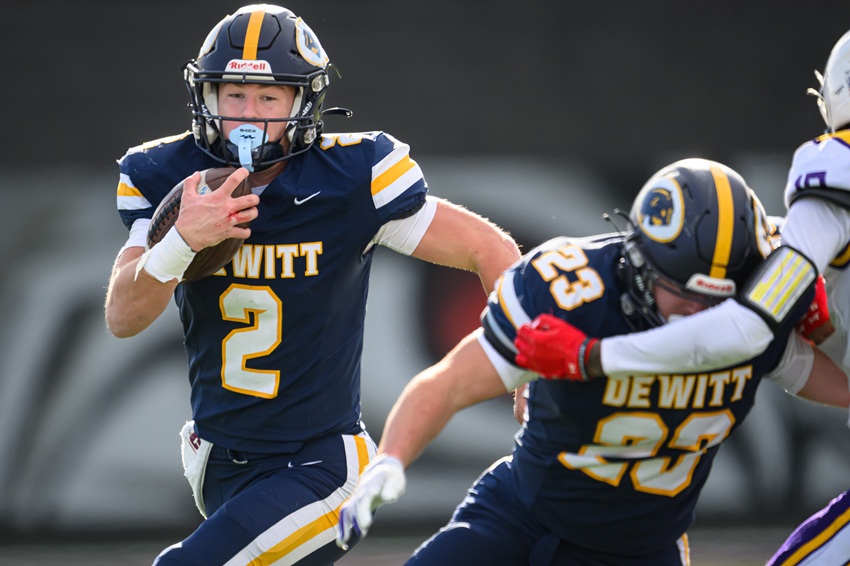 DeWitt's Traverse Moore (2) follows a blocker during the Panthers' Division 3 win over Warren De La Salle Collegiate.