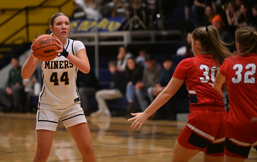 Negaunee's Clare O'Donnell looks for an open teammate during her team’s Dec. 19 win over Ishpeming Westwood.