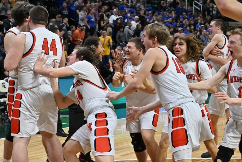 Kubasaki defends boys hoops title